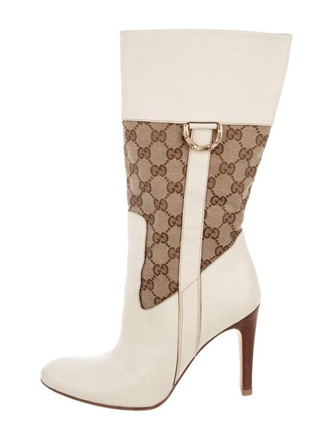 high heel gucci boots.